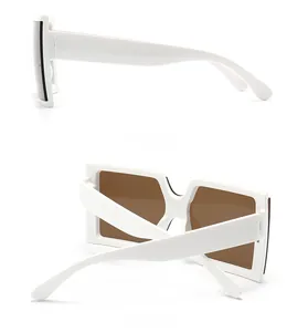 Detailed side and back view of retro square chunky white frame sunglasses with brown lenses