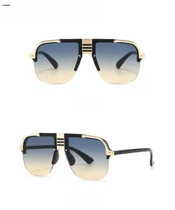 Flat top oversized aviator sunglasses with gold bridge bars and gradient blue to tan lenses