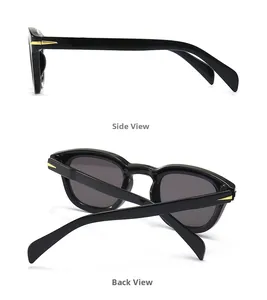 Detail view of black square sunglasses featuring a signature golden arrow hinge design