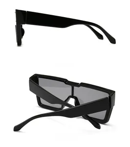 Side and back view of oversized black square sunglasses with thick glossy temples