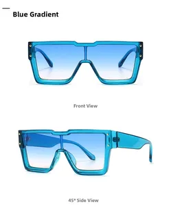 Detail of oversized square sunglasses in gradient blue with silver metal rivet accents