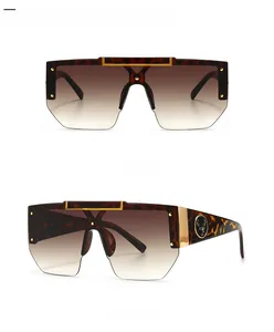 Detail showing leopard print frame and deer emblem on square gradient sunglasses