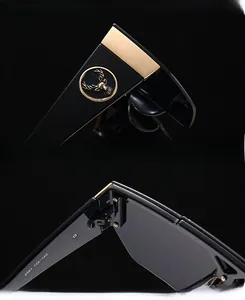 Macro detail of high-quality sunglasses featuring gold deer head emblem and metal hinge