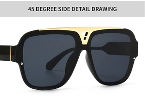 Detail von Oversize-Sonnenbrille mit goldenem Metallsteg und geometrischen Details am Rahmen