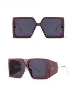 Detail view of violet square sunglasses with fashion relief and 45-degree angle