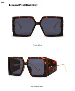 Detail of square sunglasses with grey leopard frame and Fashion logo on the temple