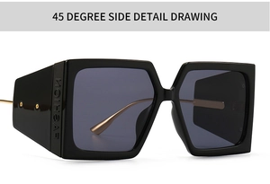 Detail view of bold square sunglasses featuring thick side frames and golden metal temples