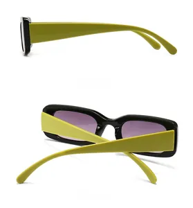 Side and back views of rectangular black sunglasses with vibrant lime green temples