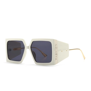 Modern oversized square sunglasses with cream frame and gold metal temples