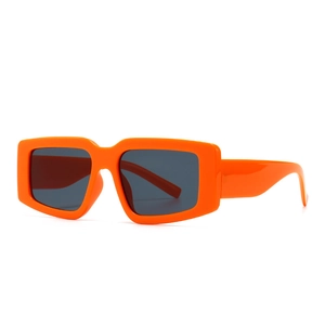 Modern rectangular sunglasses with bold orange frames and dark grey lenses on white background