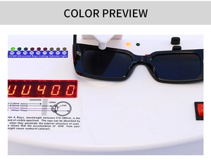 Close-up of black rectangular sunglasses during UV400 protection functional test