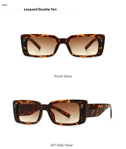 Detail view of leopard print square sunglasses with tan gradient lenses and metal rivets
