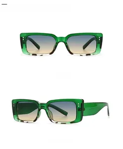 Front and 45-degree side view of vintage green rectangle sunglasses with metal rivets