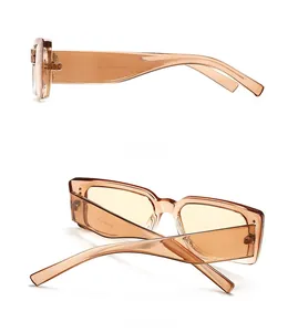 Detailed side view of tortoise shell rectangular sunglasses with metal rivets and logo
