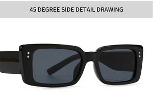 Close-up of retro rectangular sunglasses frame with side 45 degree view and silver rivets
