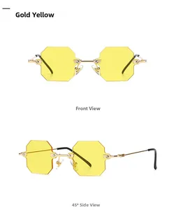 Close-up of modern rimless octagonal sunglasses with yellow lenses and gold metal frames
