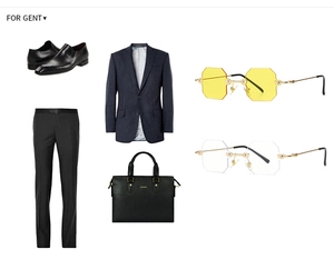 Flat lay of modern octagonal sunglasses with business suit and leather briefcase