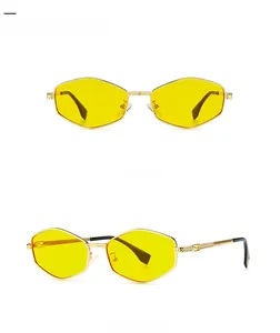 Detail view of gold hexagonal sunglasses with yellow lenses showing front and 45 degree angle