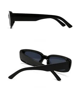 Side and back view showing the wide temples of modern vintage black rectangular sunglasses
