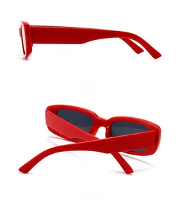 Side and back view of red rectangular frame sunglasses with thick temples and dark lenses
