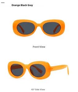 Detail view of modern orange oval sunglasses featuring thick frames and dark lenses