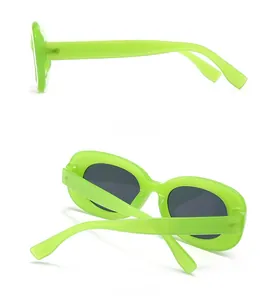 Detail view of neon green retro oval sunglasses showing the side and back frames