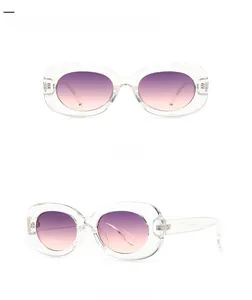 Detail view of transparent pink oval sunglasses with gradient lenses from front and side