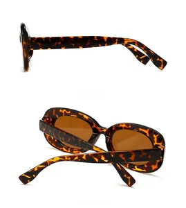 Side and back view of retro tortoiseshell sunglasses with brown lenses and thick temples