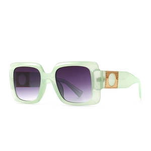 Modern square sunglasses with light green translucent frame and purple gradient lenses