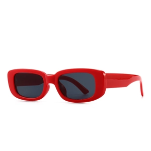 Modern retro red rectangle frame sunglasses with dark lenses for fashion street style
