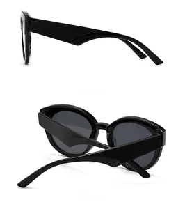 Vue latérale et arrière de lunettes de soleil rétro noires avec branches texturées