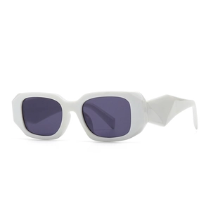 Modern retro square white geometric sunglasses with dark lenses from a side angle