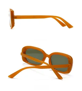 Vues latérale et arrière de lunettes de soleil rétro orange à monture épaisse