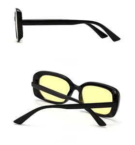 Vue détaillée latérale et arrière de lunettes de soleil ovales rétro à monture noire