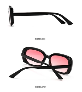 Vues latérale et arrière de lunettes de soleil ovales rétro avec monture noire et verres rouges