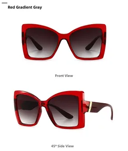 Front and side view of red translucent cat-eye sunglasses with gradient grey lenses