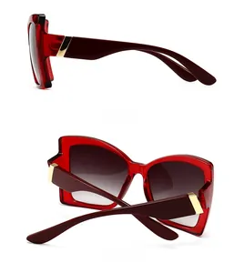 Side and back view of square cat-eye sunglasses with translucent dark red frames
