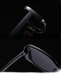 Détail des charnières renforcées et des verres des lunettes de soleil ovales noires L901