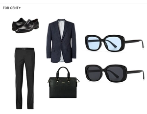 Style business avec blazer à rayures bleu marine, porte-documents et lunettes de soleil