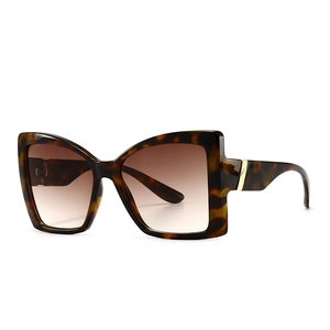 Modern tortoiseshell square sunglasses with gradient brown lenses and gold metal accents