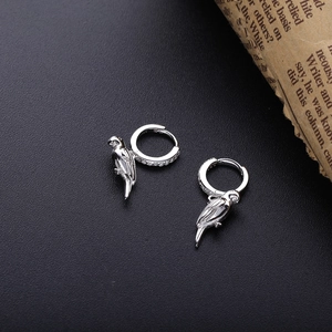 Elegant S925 silver parrot pendant earrings with zircon stones on black leather background