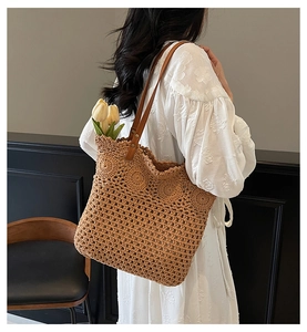 Detailed crochet hollow out weave texture on summer tote with premium leather strap