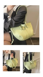 Detailed view of green lychee pattern PU leather tote with adjustable shoulder strap