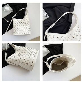 Vue détaillée du sac seau blanc à rivets montrant l'intérieur et la structure