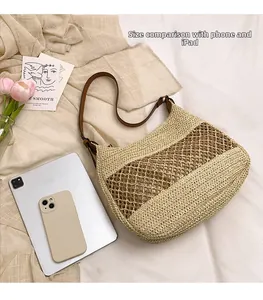 Straw tote bag detail showing large capacity with beige mesh texture and brown strap