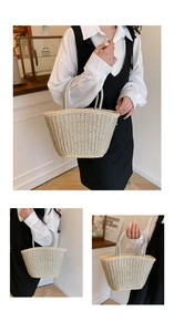 Detail of a beige straw tote bag with metallic silver weave and round silver handles