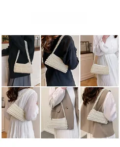 Detail of beaded pearl handbag showing multiple style options with elegant ivory pearls