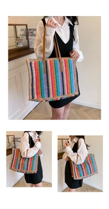 Macro view of a colorful striped woven straw tote bag with brown leather handles
