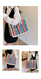 Macro detail of rainbow striped woven straw tote bag with reinforced cream shoulder straps