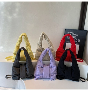 Detailed display of six quilted nylon shoulder bags with stylish bow details in multiple colors